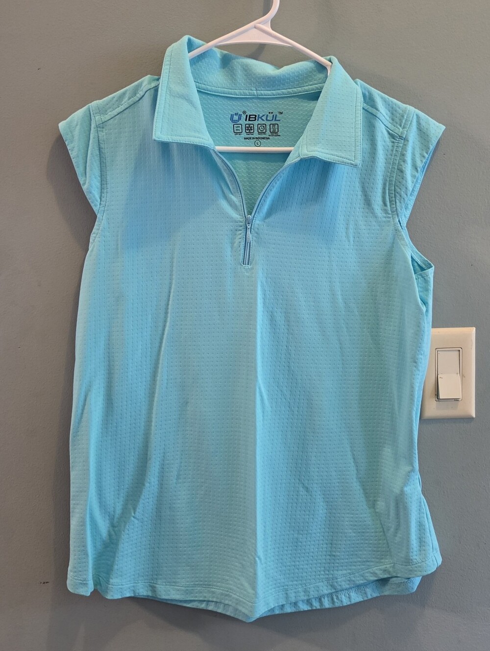 IBKUL Women's Sleeveless Half-Zip Mock Collar Top in Aqua Blue
